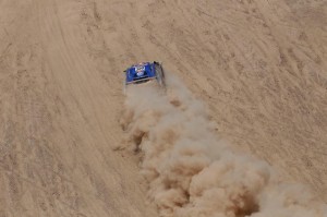 compete during the fourth stage of the 2011 Argentina-Chile Dakar Rally between Jujuy, Argentina, and Calama, Chile, Wednesday, Jan. 5, 2011. (AP Photo/Natacha Pisarenko)