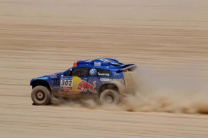 compete during the fourth stage of the 2011 Argentina-Chile Dakar Rally between Jujuy, Argentina, and Calama, Chile, Wednesday, Jan. 5, 2011. (AP Photo/Natacha Pisarenko)